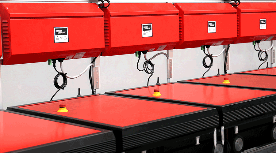 AutoStore R5 Robots at charging Ports. Image.