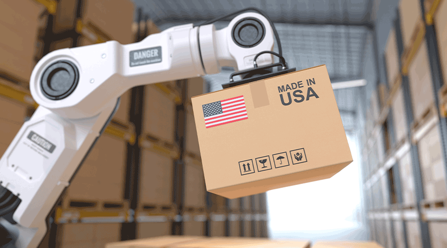 A palletizing robot moving packages. Image.