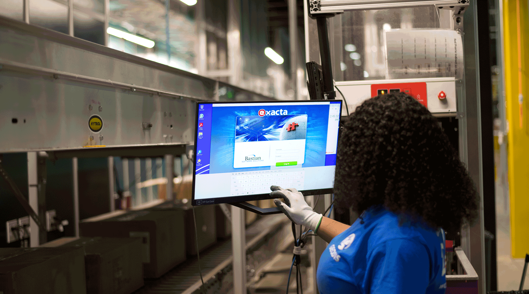 Woman using warehouse software to fulfill a customer order.